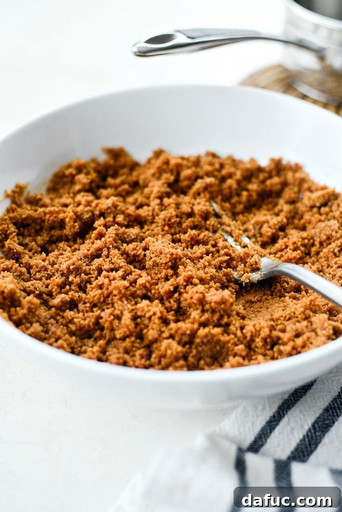 Dreamy No-Bake Pumpkin Cheesecake with a Gingersnap Crunch 6 Gingersnap Cookies Being Processed for Cheesecake Crust