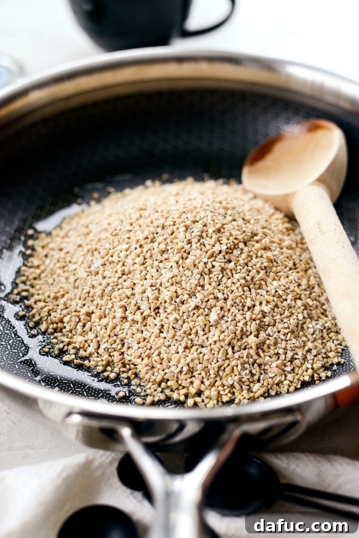 Zesty Cranberry Orange Steel Cut Oats 6 Ghee melting in a skillet, preparing for oats.