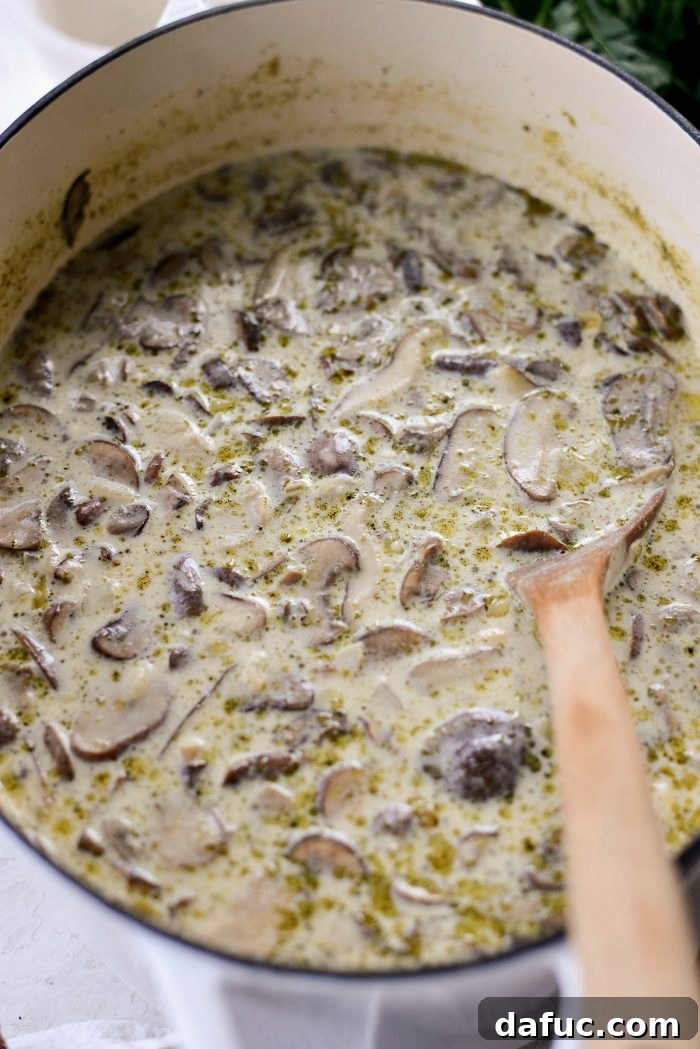 Close-up of the simmering soup, showing the creamy texture and integrated ingredients