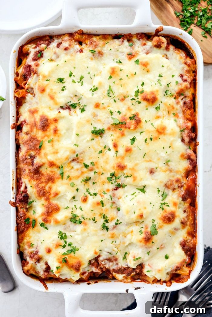 Spicy Italian Sausage Baked Ziti bubbling and golden from the oven