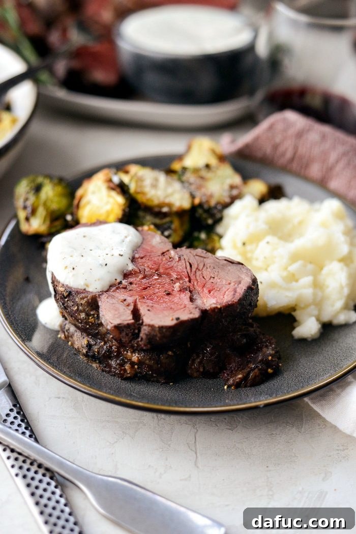 Peppercorn Crusted Beef Tenderloin 18 Final plated Black Pepper Crusted Beef Tenderloin for serving.