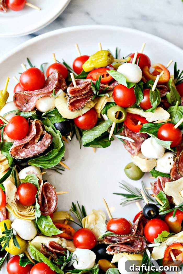 Festive Antipasto Centerpiece 7 Adding Rosemary to the Holiday Antipasto Wreath
