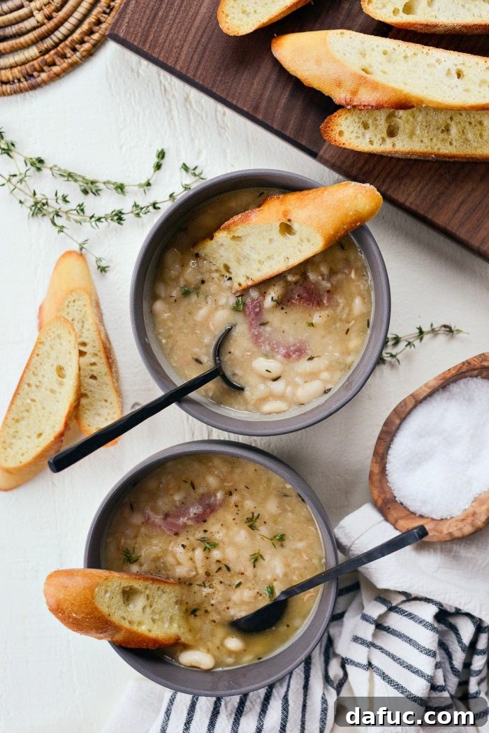 Hearty Ham and White Bean Soup 19 Multiple bowls of Ham and White Bean Soup, showcasing its comforting and appetizing appeal.