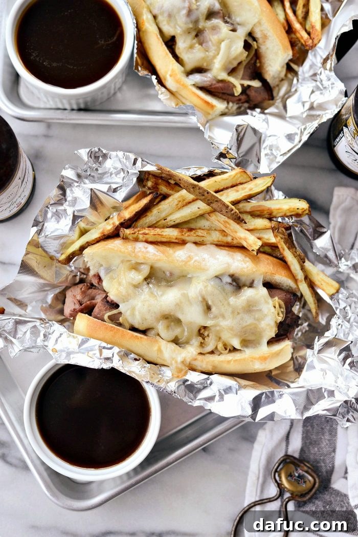 Effortless French Dip Delights 15 Perfectly baked French Dip sandwiches with golden, melted provolone cheese