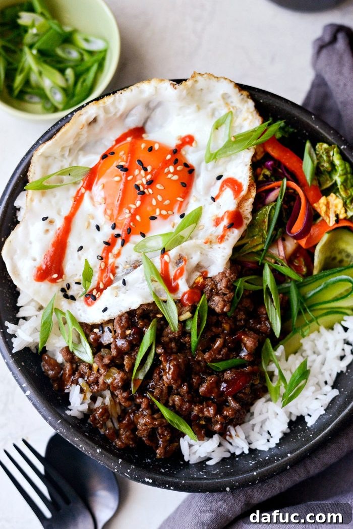 Bulgogi Power Bowls 2 Delicious Korean BBQ Beef Bowls with a fried egg and fresh ingredients for a flavorful dinner