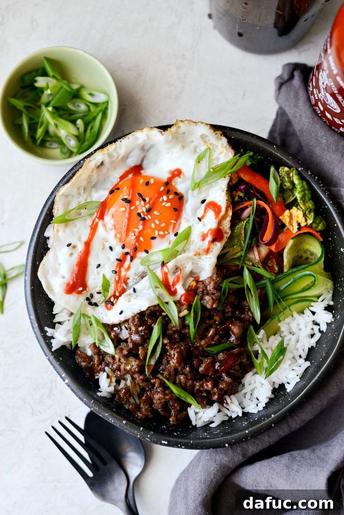 Bulgogi Power Bowls 10 Close-up of Korean BBQ beef simmering in sauce, rich and ready for serving