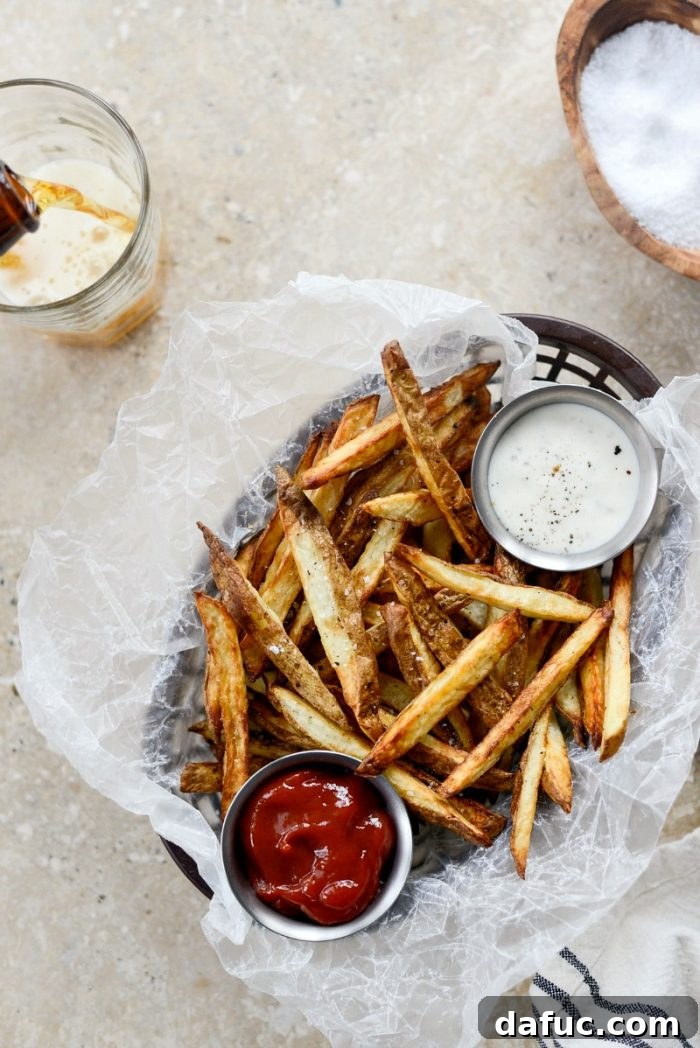 Crispy Homemade Air Fryer Fries 13 Homemade Air Fryer French Fries served in a white bowl, ready to be enjoyed