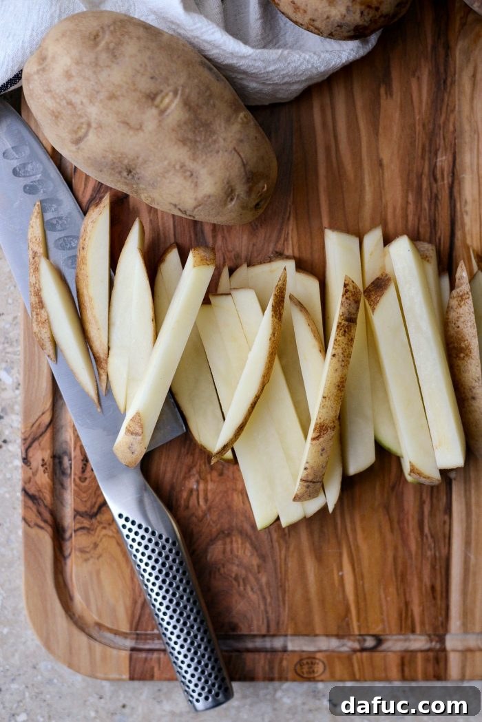 Crispy Homemade Air Fryer Fries 6 Expertly sliced Russet potato planks, uniform in thickness