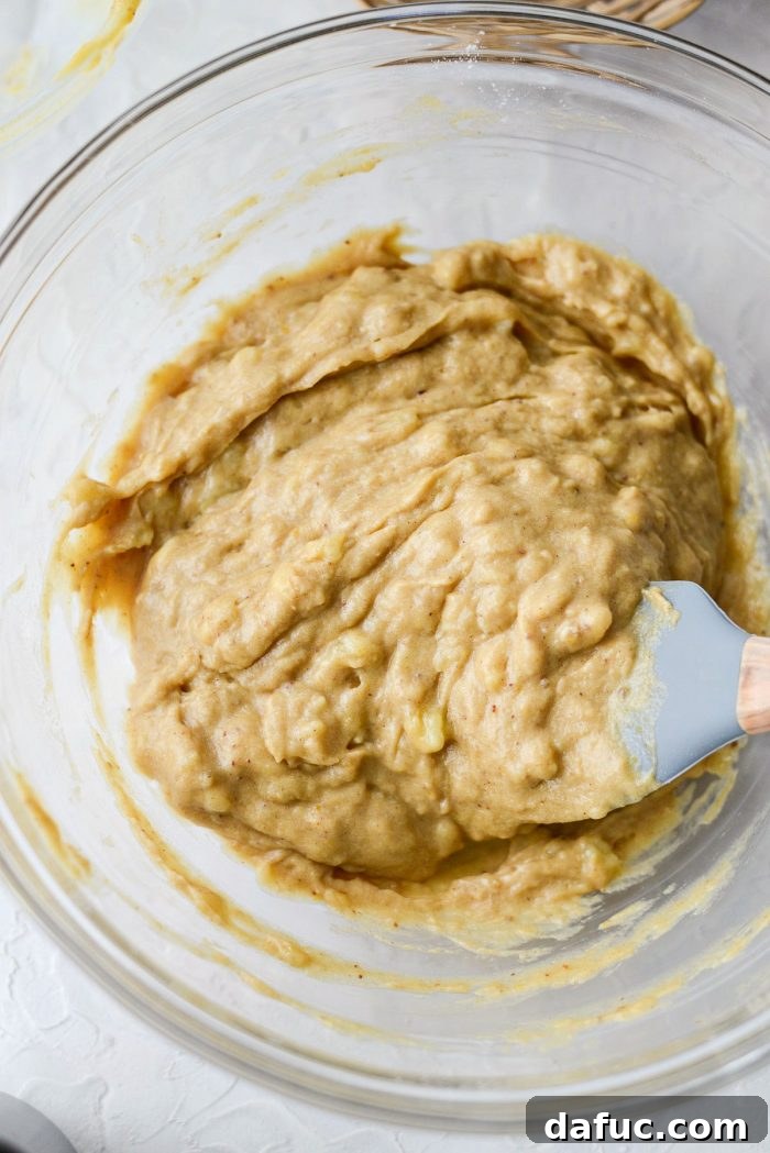 Cream Cheese Swirled Banana Bread 12 Close-up of banana and wet ingredient mixture