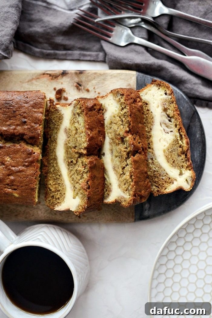 Cream Cheese Swirled Banana Bread 3 Slice of Cheesecake Banana Bread revealing the creamy swirl