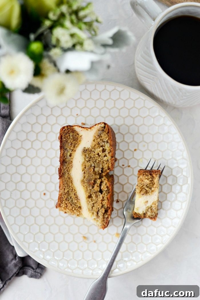 Cream Cheese Swirled Banana Bread 21 Final close-up of a perfect slice of Cheesecake Banana Bread