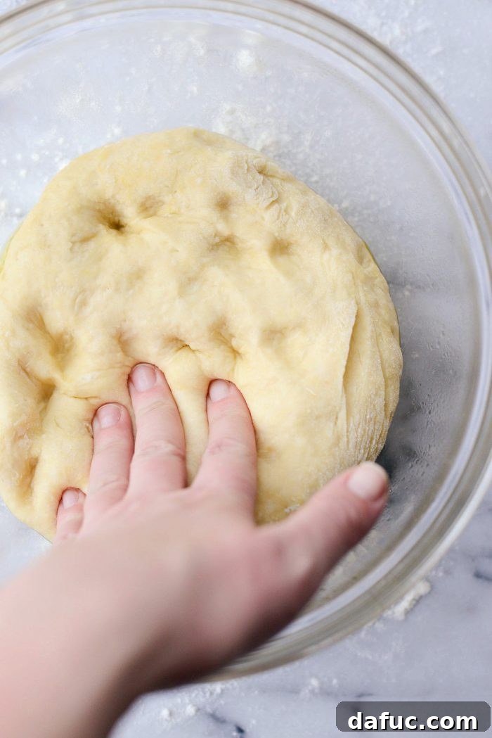 Air-Fried Glazed Doughnut Delight 12 Dough rising in a bowl