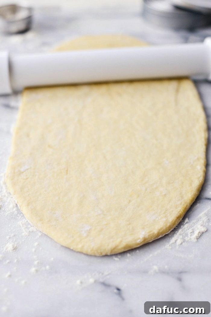 Air-Fried Glazed Doughnut Delight 13 Rolling out doughnut dough