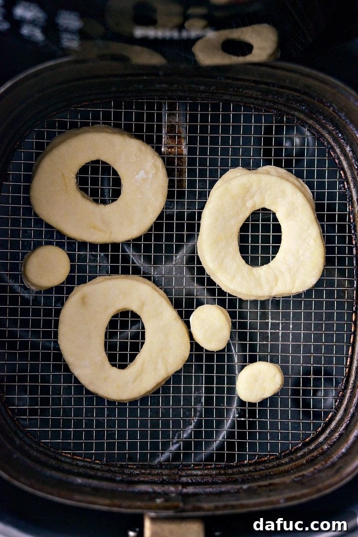 Air-Fried Glazed Doughnut Delight 18 Air Fryer Glazed Doughnuts cooling