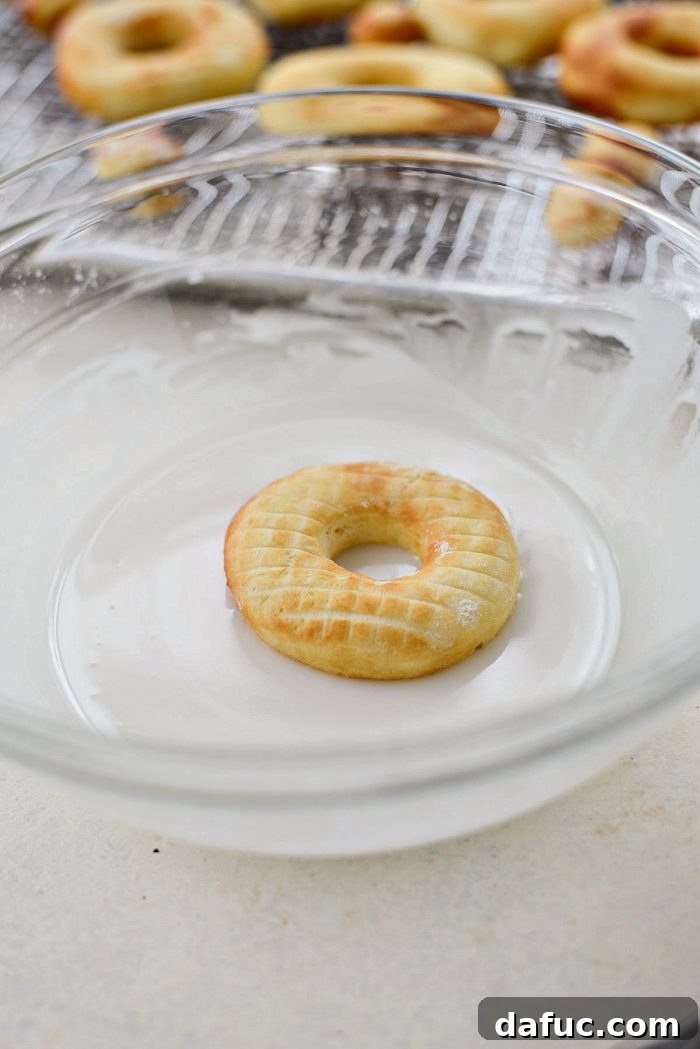Air-Fried Glazed Doughnut Delight 22 Dipping doughnuts in glaze