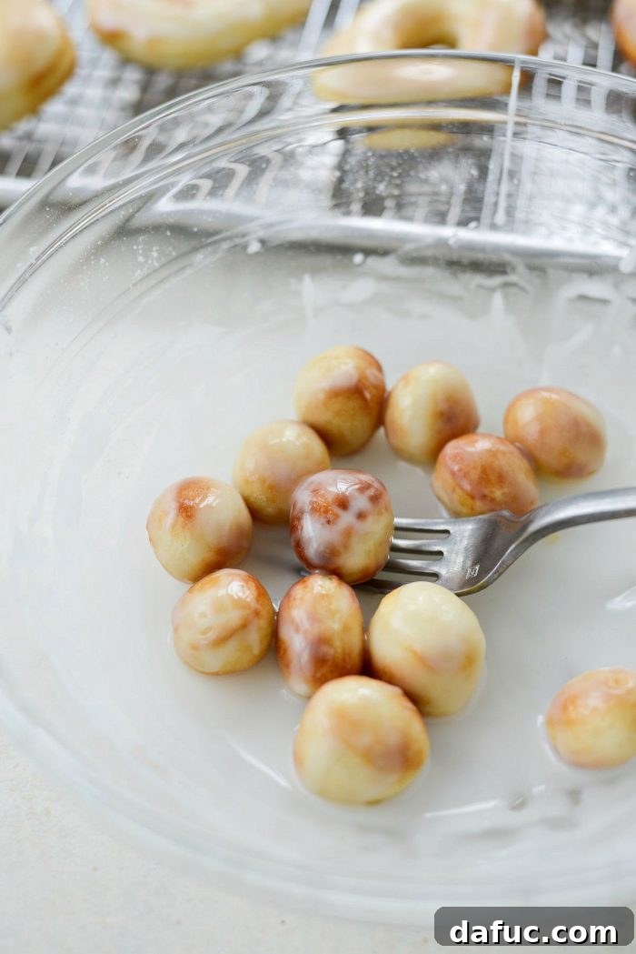 Air-Fried Glazed Doughnut Delight 24 Doughnut holes getting glazed