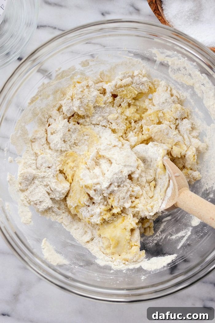 Air-Fried Glazed Doughnut Delight 8 Mixing wet and dry ingredients for doughnut dough