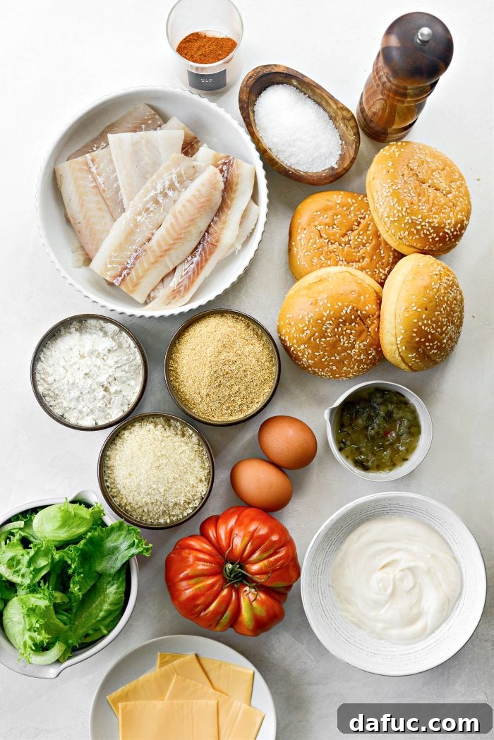 Golden Crispy Fish Sandwiches 4 Ingredients for Crispy Fish Sandwich including pollock, old bay, panko, and brioche buns