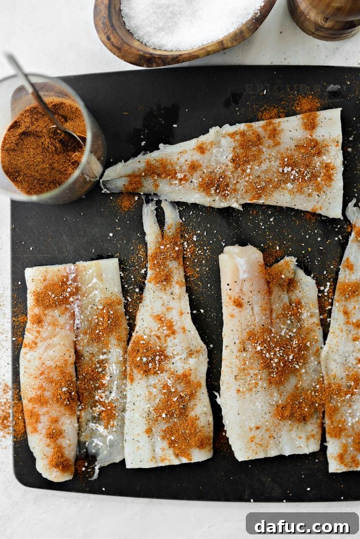 Golden Crispy Fish Sandwiches 8 Seasoning fish with Old Bay, salt, and pepper