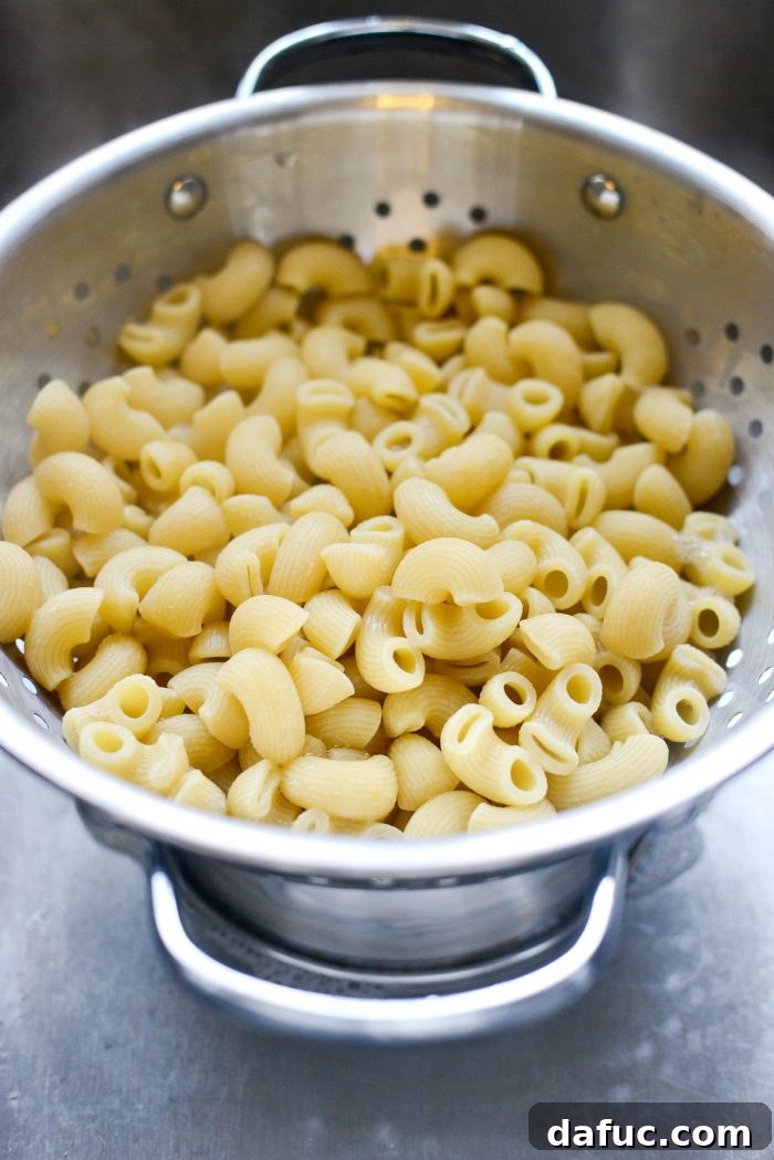 Opulent Lobster Mac and Cheese 14 Smooth, melted cheese sauce in a saucepan, removed from heat.