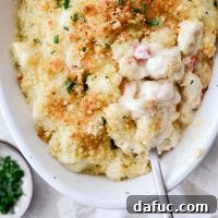 Opulent Lobster Mac and Cheese 27 Gourmet Lobster Mac and Cheese dish, a recipe card image.
