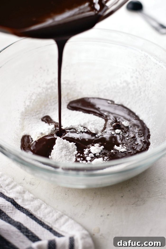 Whisked eggs and egg yolks, light, frothy, and slightly pale, prepared for the cake batter