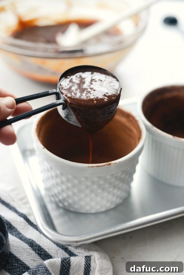 Glossy, rich chocolate lava cake batter, perfectly mixed and ready for baking