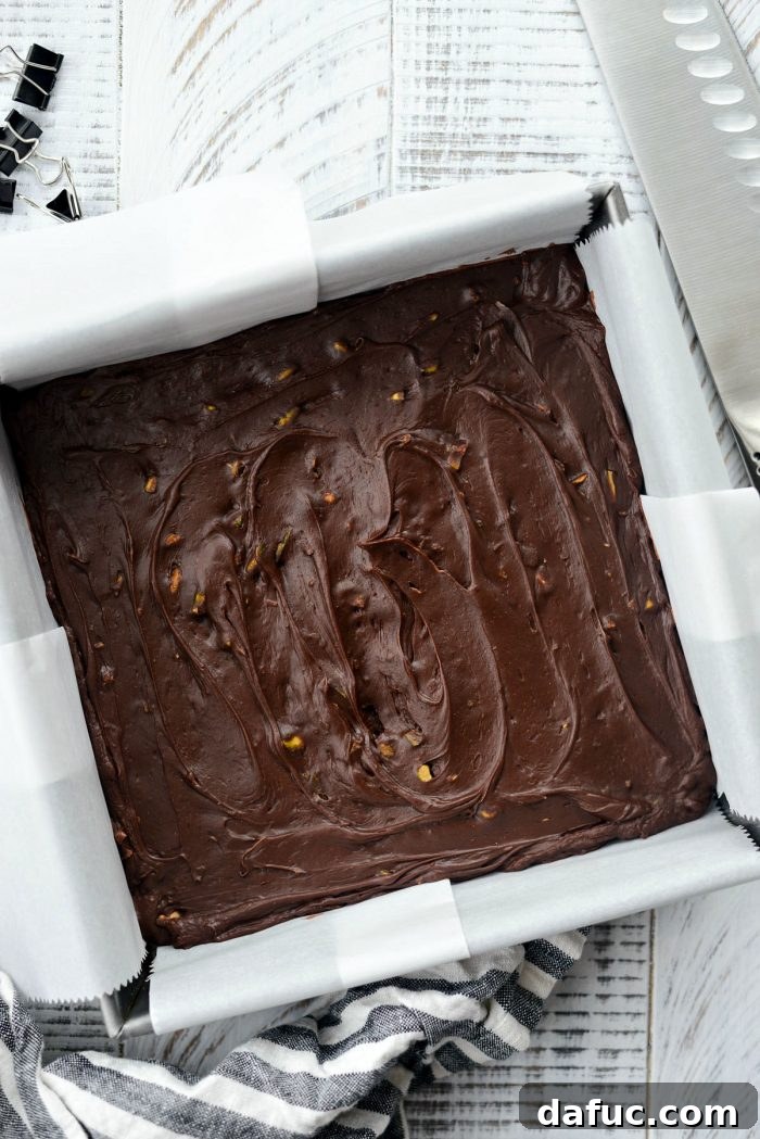 Baileys Chocolate Pistachio Fudge chilling in the refrigerator.