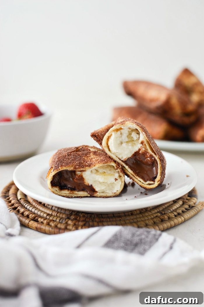 Air Fryer Cheesecake Chimichangas l SimplyScratch.com #airfryer #airfried #airfry #recipe #cheesecake #chimichanga #easy