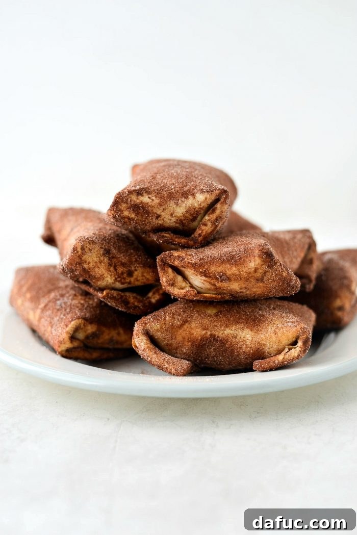 Air Fryer Cheesecake Chimichangas l SimplyScratch.com #airfryer #airfried #airfry #recipe #cheesecake #chimichanga #easy