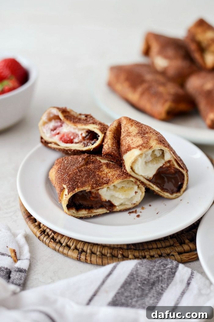 Air Fryer Cheesecake Chimichangas l SimplyScratch.com #airfryer #airfried #airfry #recipe #cheesecake #chimichanga #easy