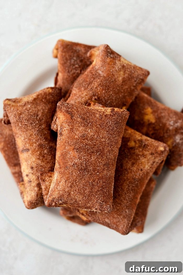 Air Fryer Cheesecake Chimichangas l SimplyScratch.com #airfryer #airfried #airfry #recipe #cheesecake #chimichanga #easy