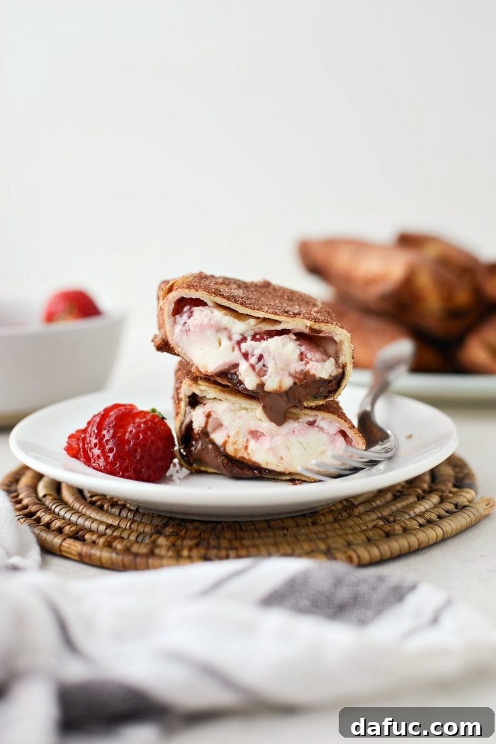Air Fryer Cheesecake Chimichangas l SimplyScratch.com #airfryer #airfried #airfry #recipe #cheesecake #chimichanga #easy