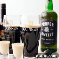 Emerald Slam 12 Irish Slammer: A classic St. Patrick's Day bar drink with Guinness, Irish Cream, and Irish Whiskey.