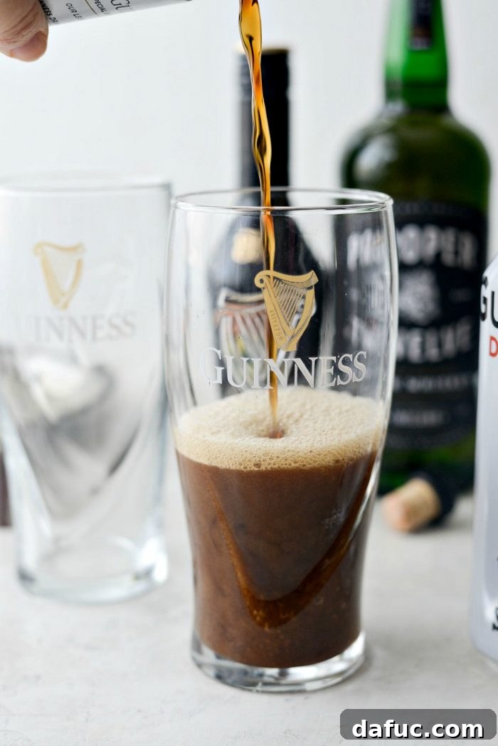 Emerald Slam 4 Pouring Guinness into a pint glass