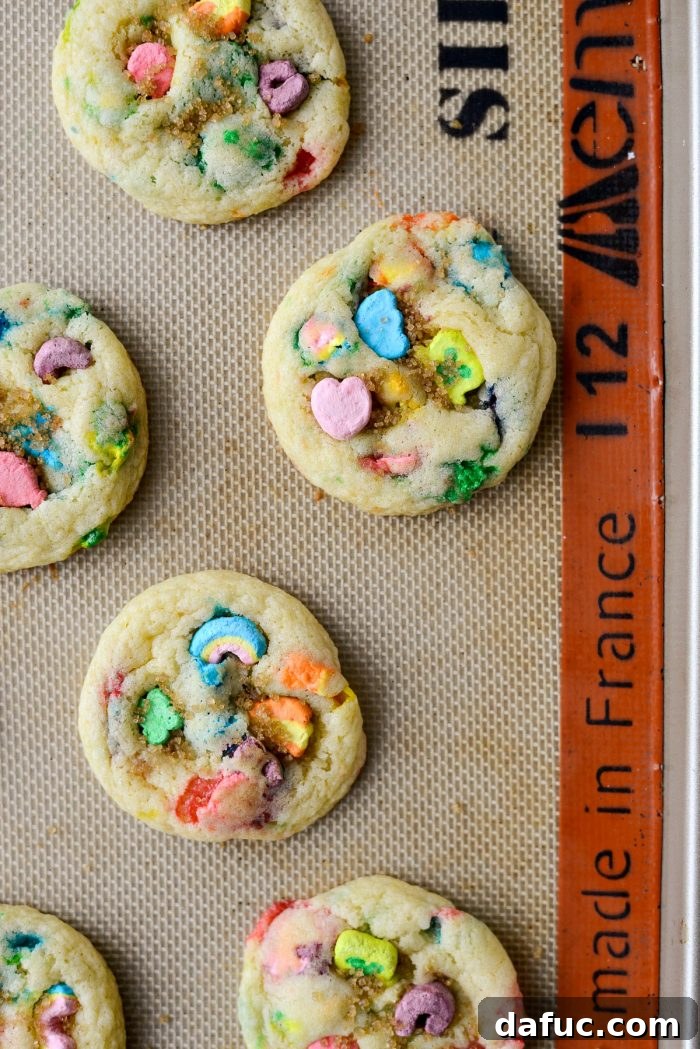 Lucky Charms Cookies l SimplyScratch.com #luckycharms #cookies #stpatricksday #recipe #treat #schoolparty #baking