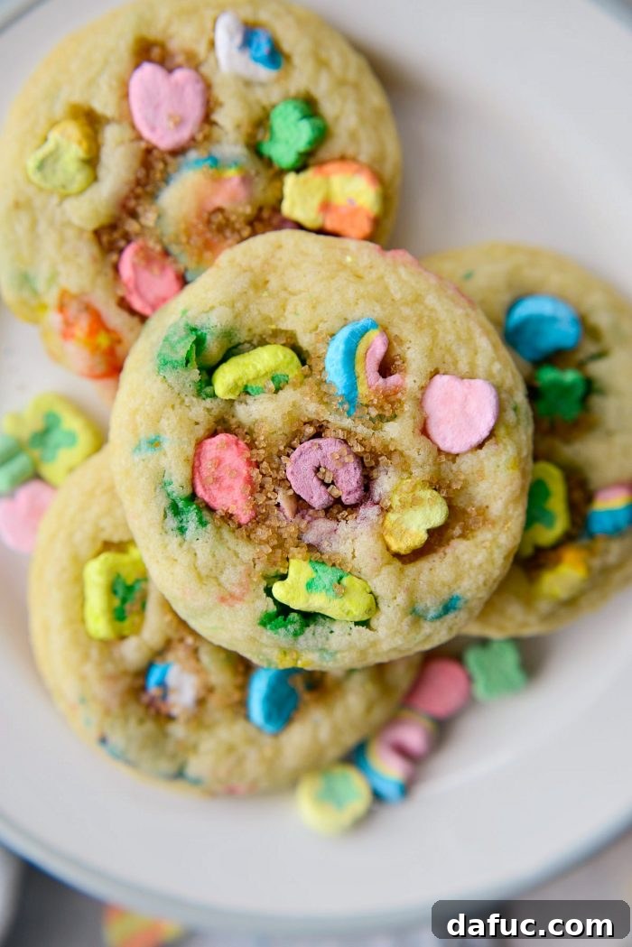 Lucky Charms Cookies l SimplyScratch.com #luckycharms #cookies #stpatricksday #recipe #treat #schoolparty #baking