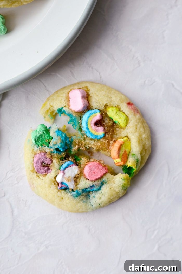 Lucky Charms Cookies l SimplyScratch.com #luckycharms #cookies #stpatricksday #recipe #treat #schoolparty #baking