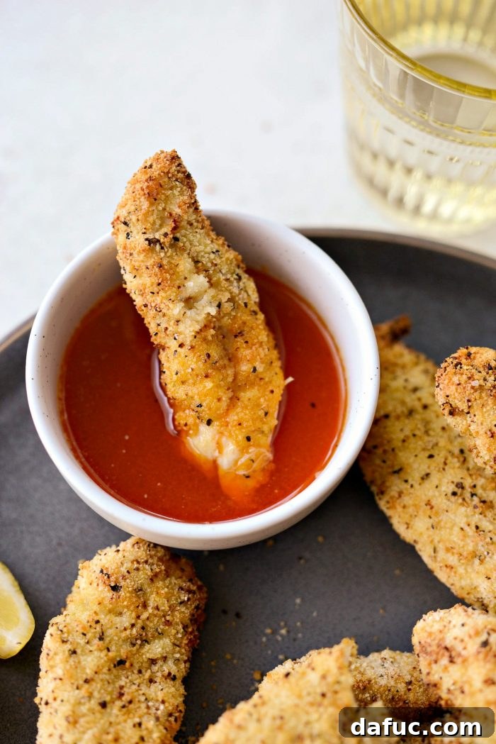 Air Fryer Lemon Pepper Chicken Tenders on a plate