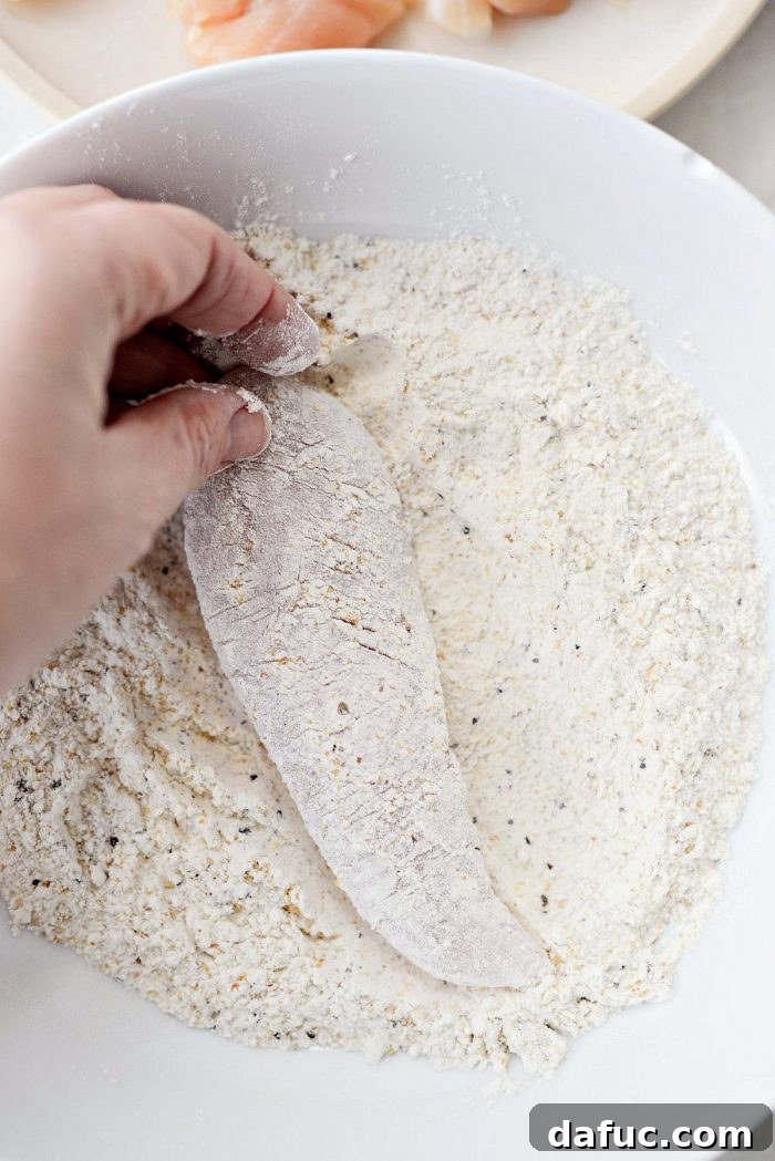 Setting up a breading station for chicken tenders