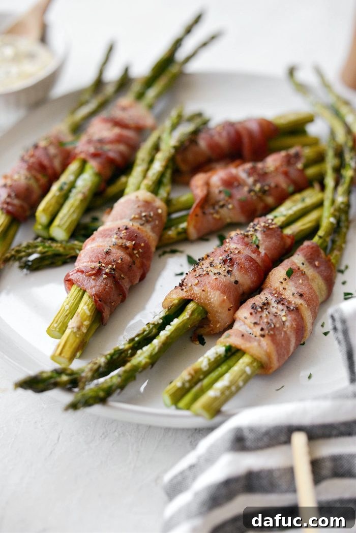 Crispy Bacon Asparagus Treats 3 Close-up of crispy Bacon Wrapped Asparagus Bundles