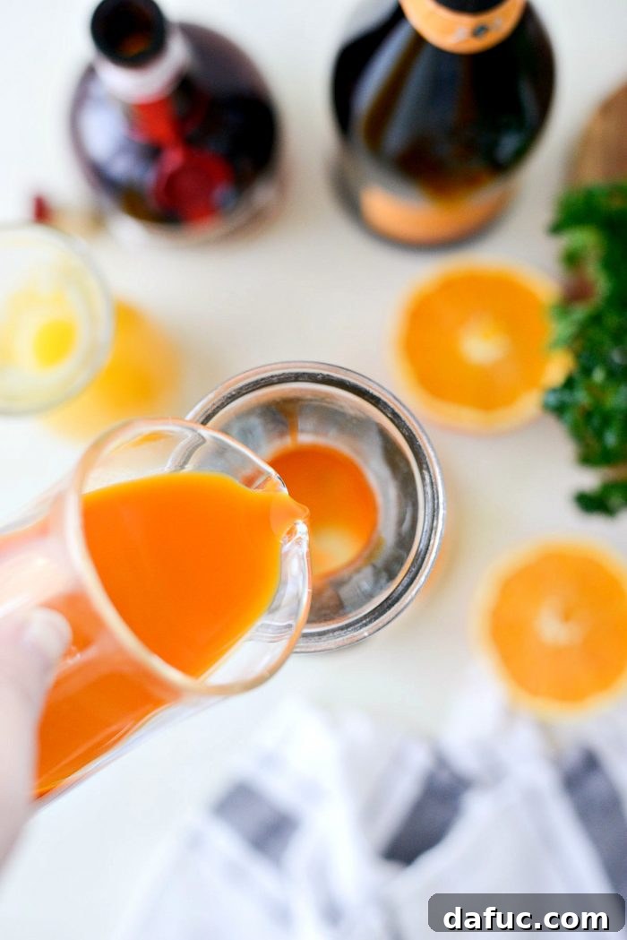 Golden Glow Mimosa 4 Individual ingredient shots of carrot juice, orange juice, and Grand Marnier, meticulously arranged for making Carrot Orange Mimosas.