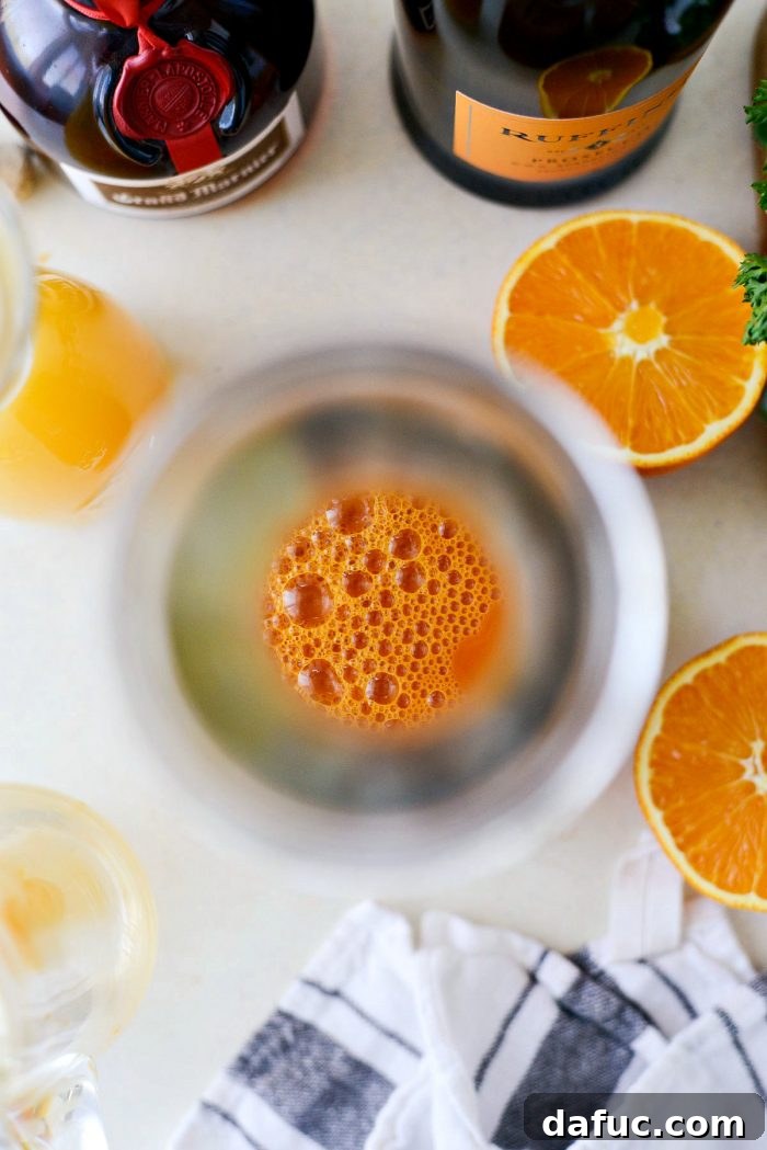 Golden Glow Mimosa 5 A pristine glass pitcher, waiting to be filled with the colorful components of the Carrot Orange Mimosa mixture.
