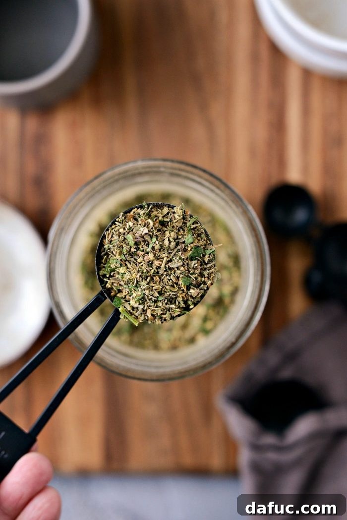 A final beauty shot of the Homemade Italian Seasoning Blend in a glass jar, perfectly lit and ready to inspire delicious meals.