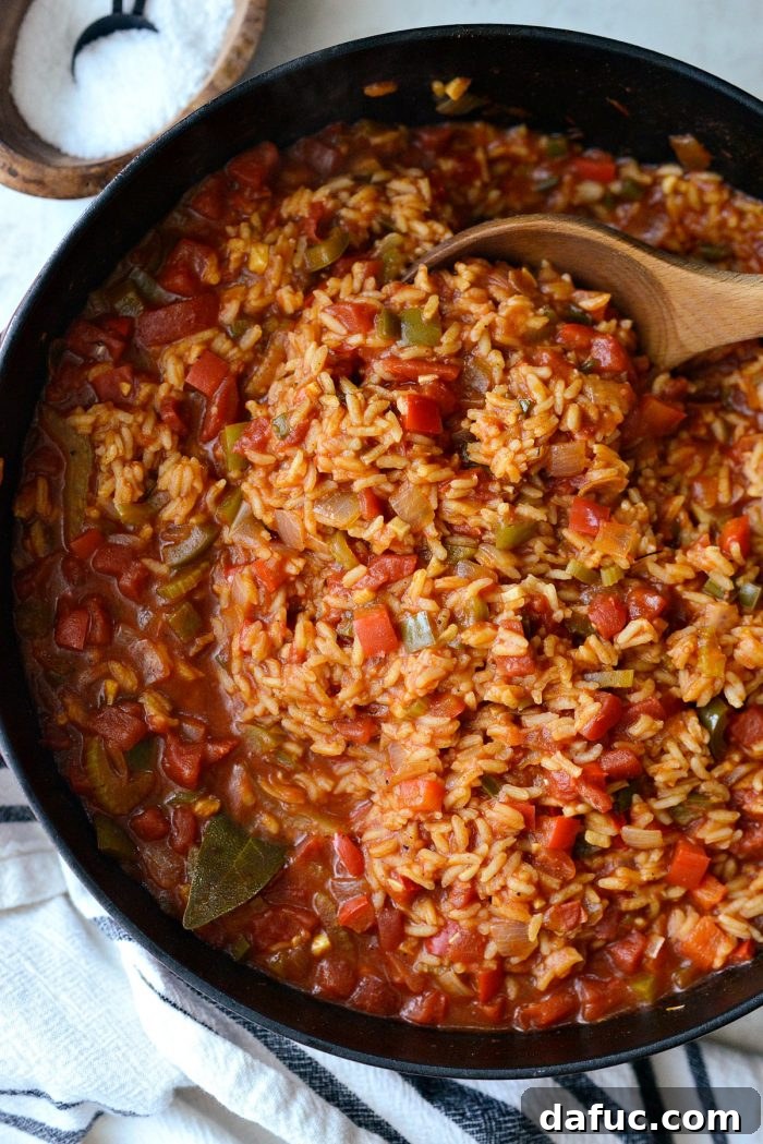 Effortless One-Pot Jambalaya 19 The jambalaya mixture, with rice, baking in the oven, creating a fragrant and delicious one-pot meal.