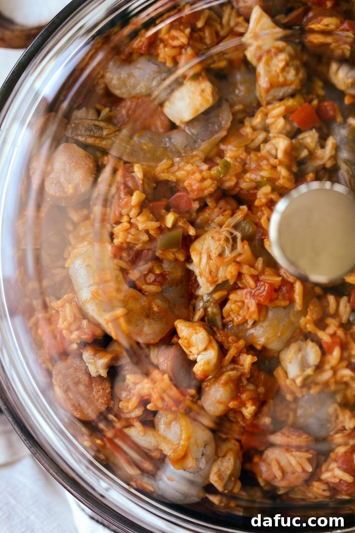 Effortless One Pot Jambalaya 22 Finished One Pot Jambalaya, perfectly cooked with shrimp, chicken, and sausage | SimplyScratch.com #skillet #shrimp #andouille #rice #creole #chicken #homemade
