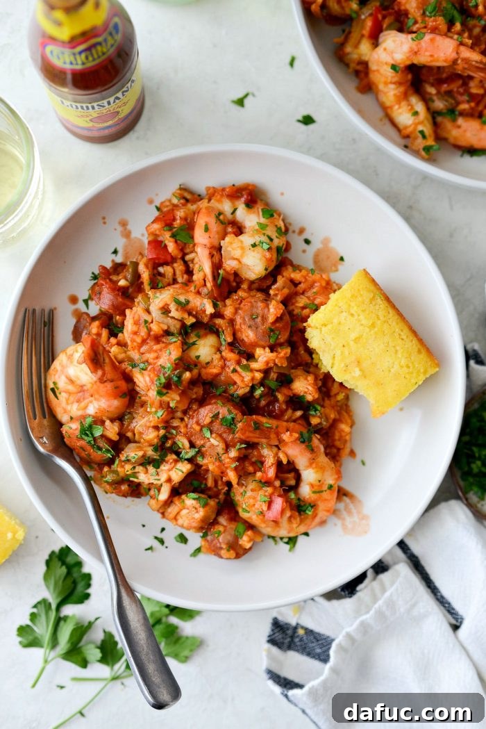 Effortless One Pot Jambalaya 24 Close-up of One Pot Jambalaya showing tender shrimp, sausage, and spiced rice | SimplyScratch.com #skillet #shrimp #andouille #rice #creole #chicken #homemade