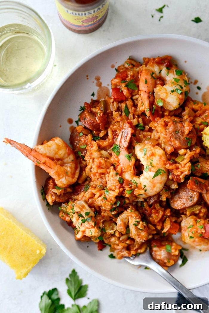 Effortless One Pot Jambalaya 27 Final plated One Pot Jambalaya, beautifully presented | SimplyScratch.com #skillet #shrimp #andouille #rice #creole #chicken #homemade