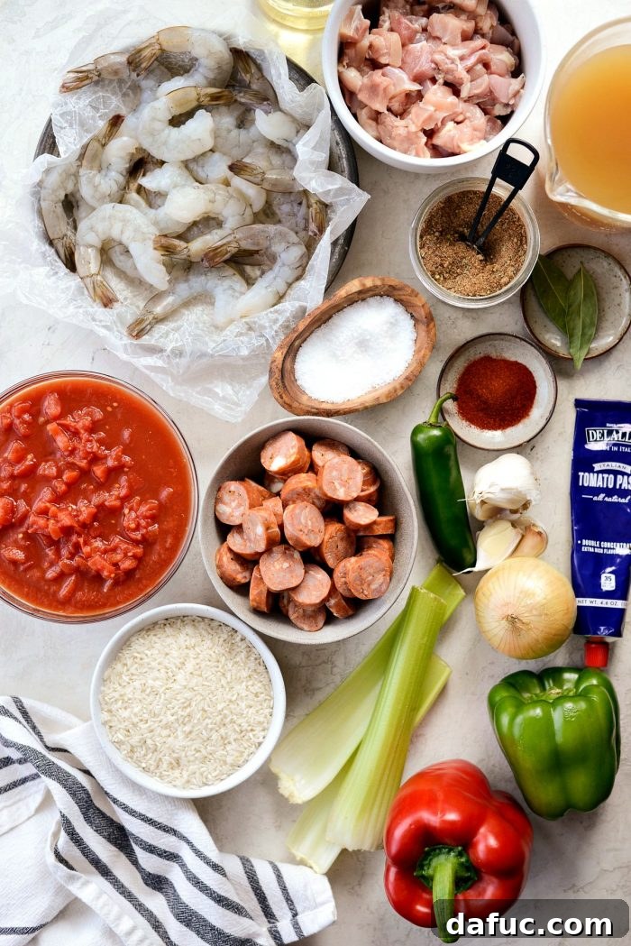 Effortless One Pot Jambalaya 4 Delicious One Pot Jambalaya served with cornbread | SimplyScratch.com #skillet #shrimp #andouille #rice #creole #chicken #homemade