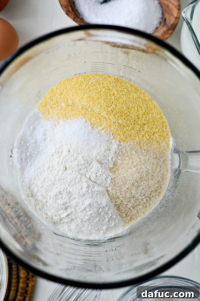 Classic Golden Cornbread 4 Fresh ingredients laid out for baking cornbread.